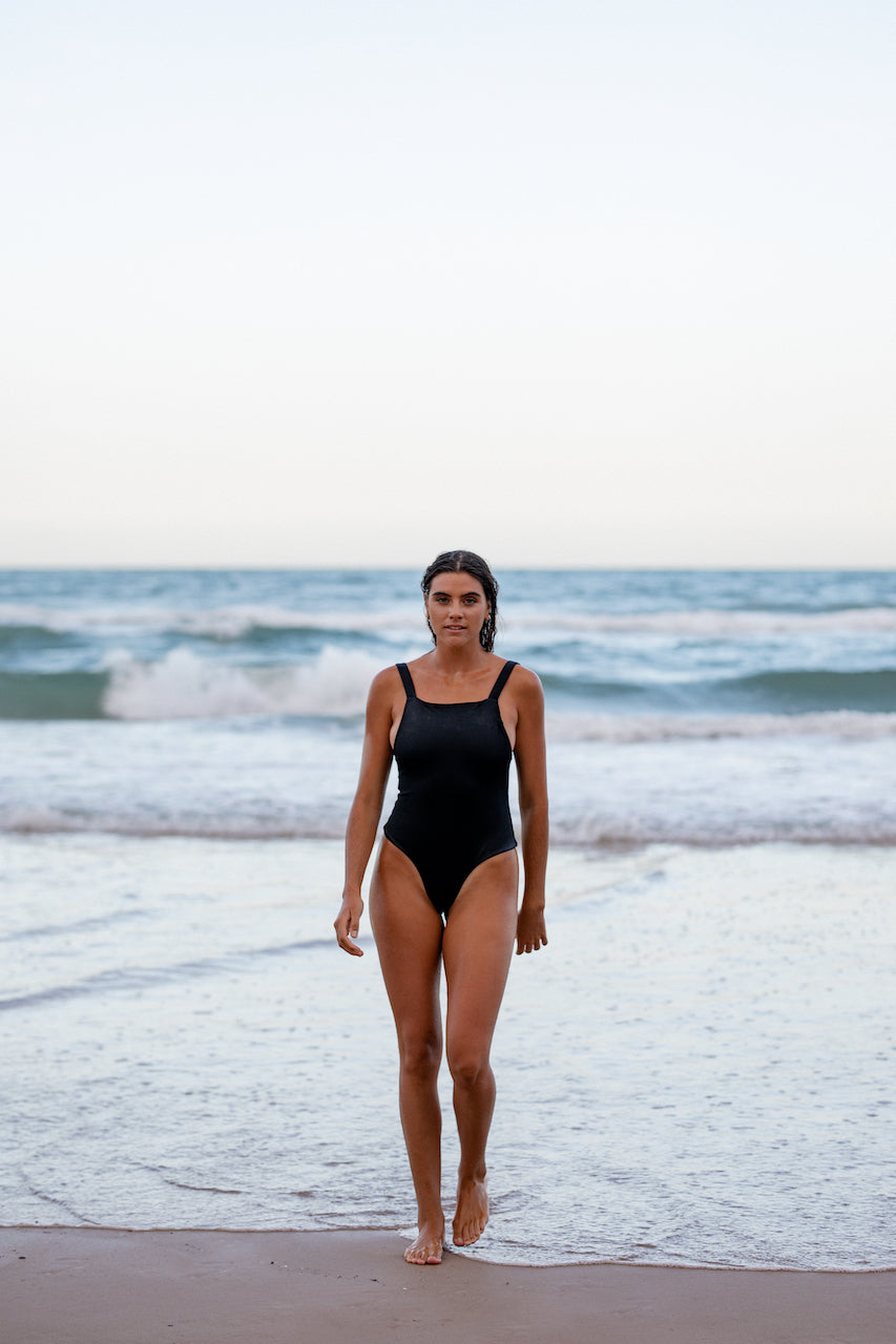 Delilah one piece - Onyx. Bringing back a timeless classic, the Delilah one piece offers an edgy take on the traditional one piece with a cheeky bottom coverage. Can be worn as a cute singlet top with jeans or skirt. Limited stock available. Once sold out, this will not re-stock.