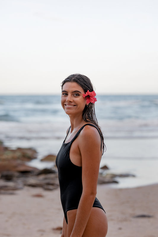Delilah one piece - Onyx. Bringing back a timeless classic, the Delilah one piece offers an edgy take on the traditional one piece with a cheeky bottom coverage. Can be worn as a cute singlet top with jeans or skirt. Limited stock available. Once sold out, this will not re-stock.