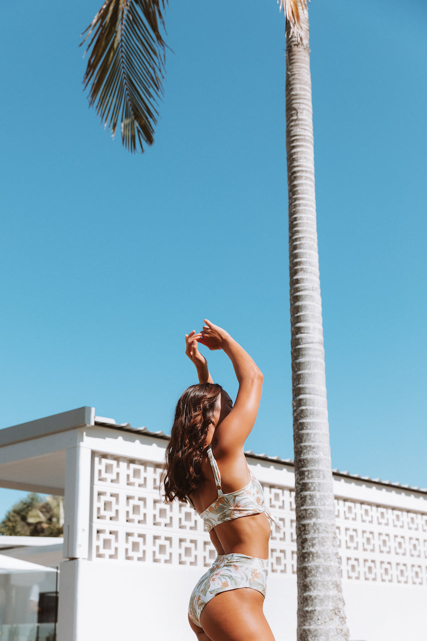 Palm Springs High Waisted Bottoms. Featuring our new Palm Springs print! These popular, high waisted, medium coverage bottoms are super comfortable, flattering and great for surfing!   Soft fabric made from recycled post consumer materials.  Looks great paired with Palm Springs printed tops and scrunchie, or the azalea tops.