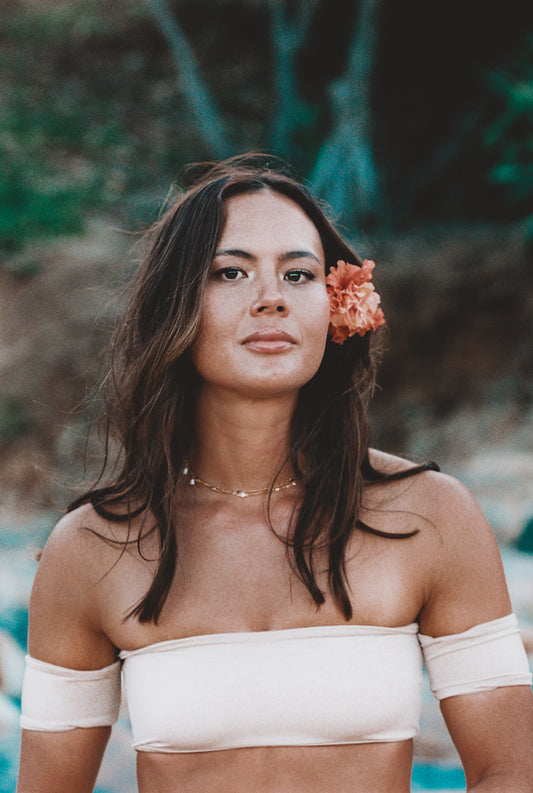 Kinsley top - Minx. For the carefree natural beach lovers, the Kinsley top offers a chic take on the original bandeau and features attached side sleeves. Designed for comfort and style in the water or as casual summer attire with a cute high waisted skirt or denim shorts.